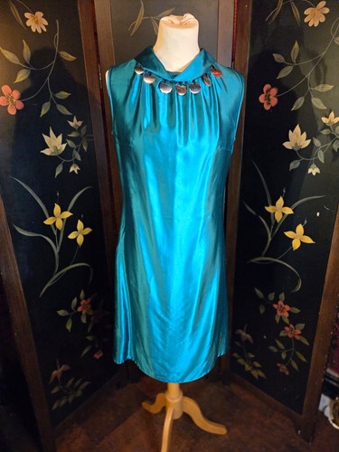Vintage teal metallic spaceage